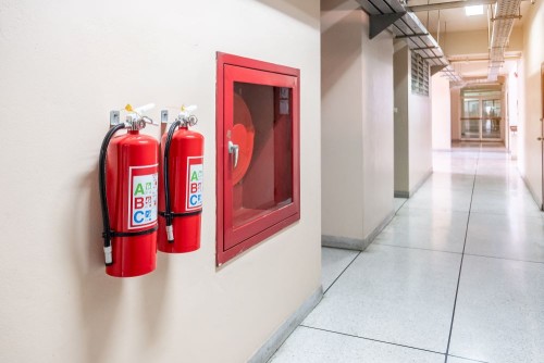 fire-extinguisher-system-wall-background-powerful-emergency-equipment-industrial.jpg