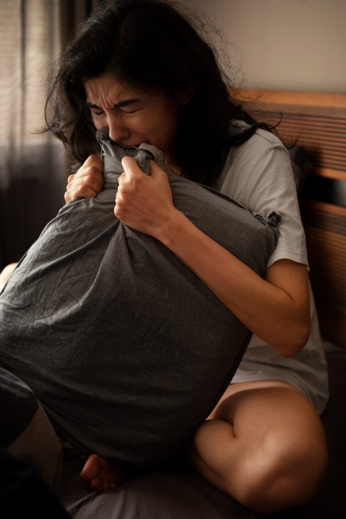 young-woman-dealing-with-anxiety.jpg